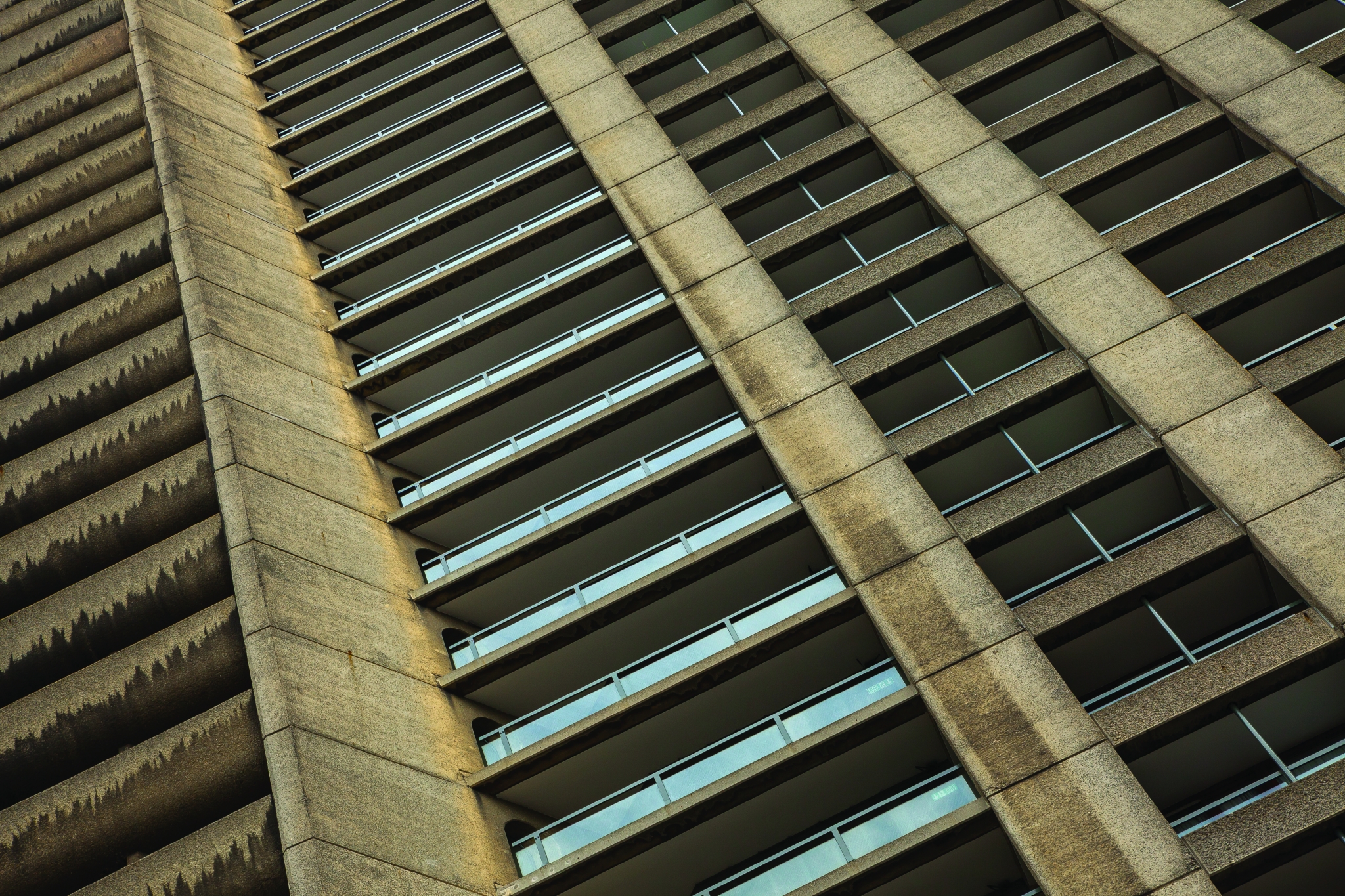 The exterior of Barbican Centre, London, showing balconies and glazing